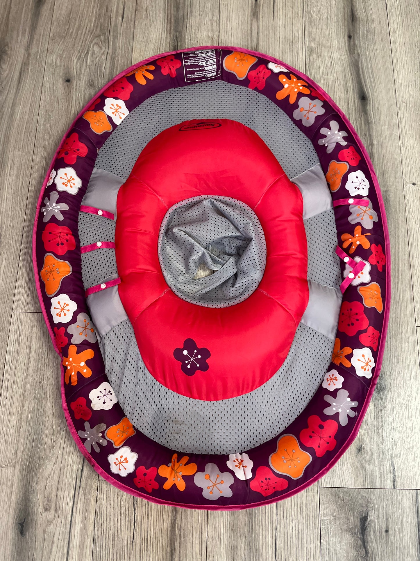 SwimWays Baby Spring Float designed for children aged 9 to 24 months
